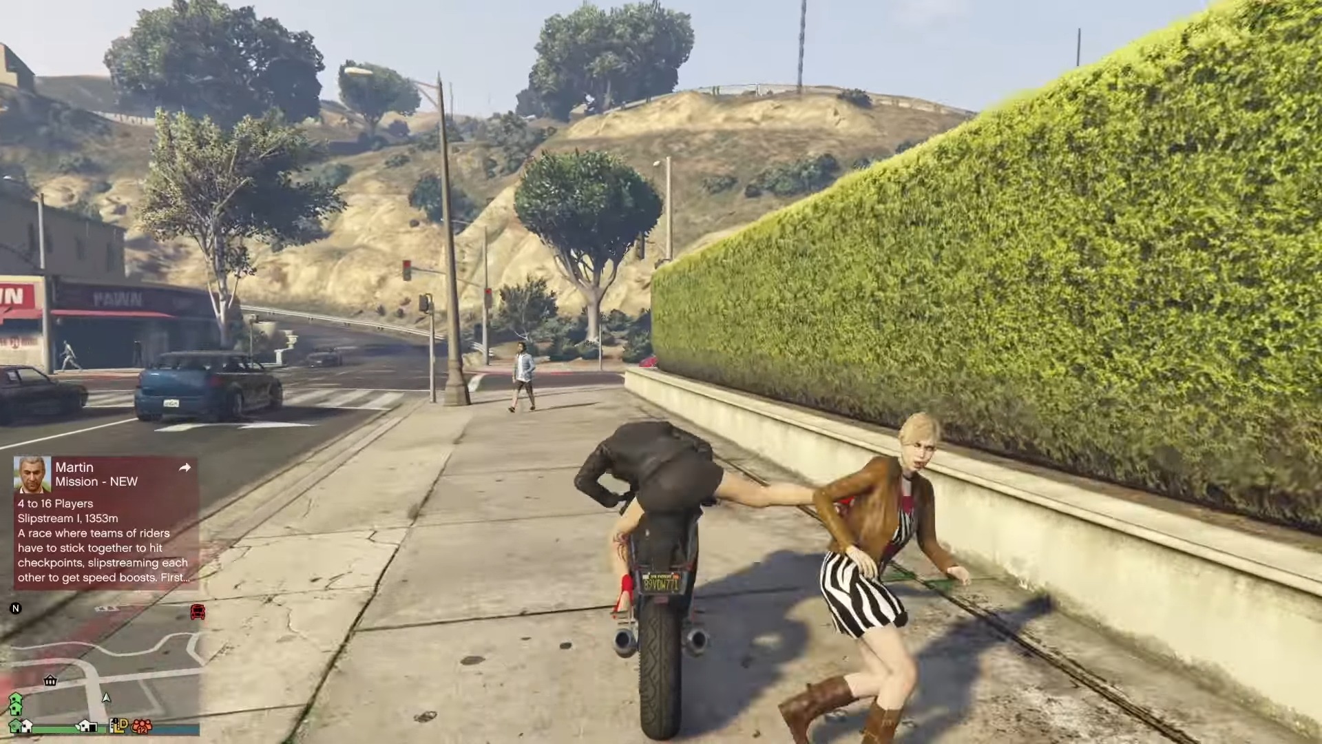 A Player Kicking a Passerby while Riding a Bike gta 5