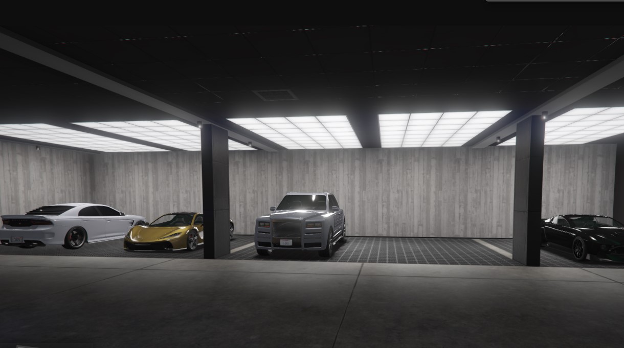 Agency Vehicle Workshop garage with 4 cars parked