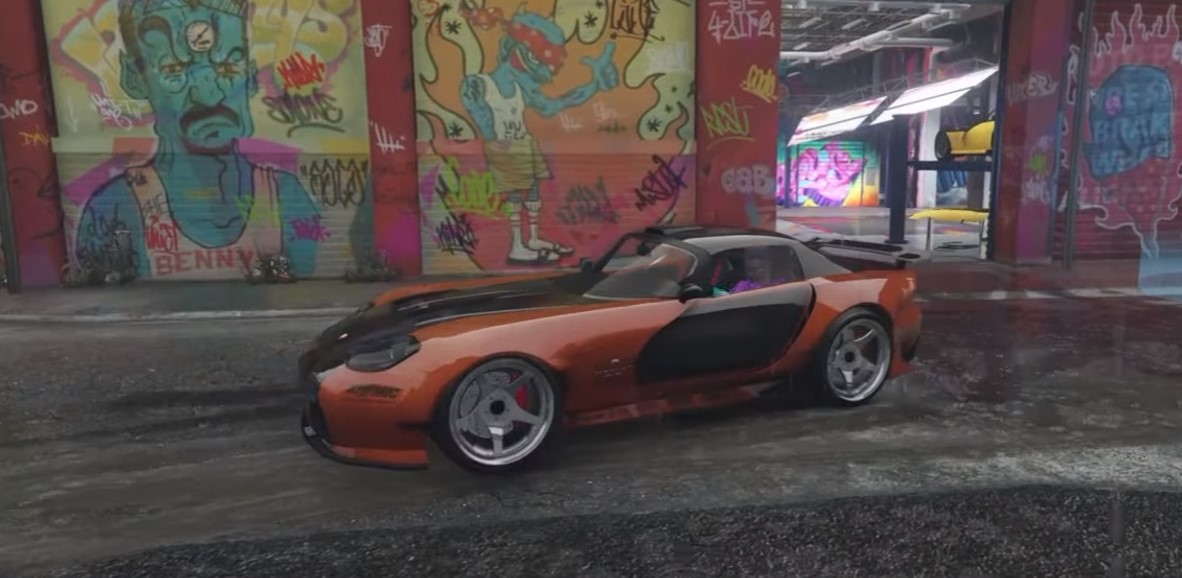 Han's Mazda RX-7 from Fast and Furious: Tokyo Drift. An orange car with black doors