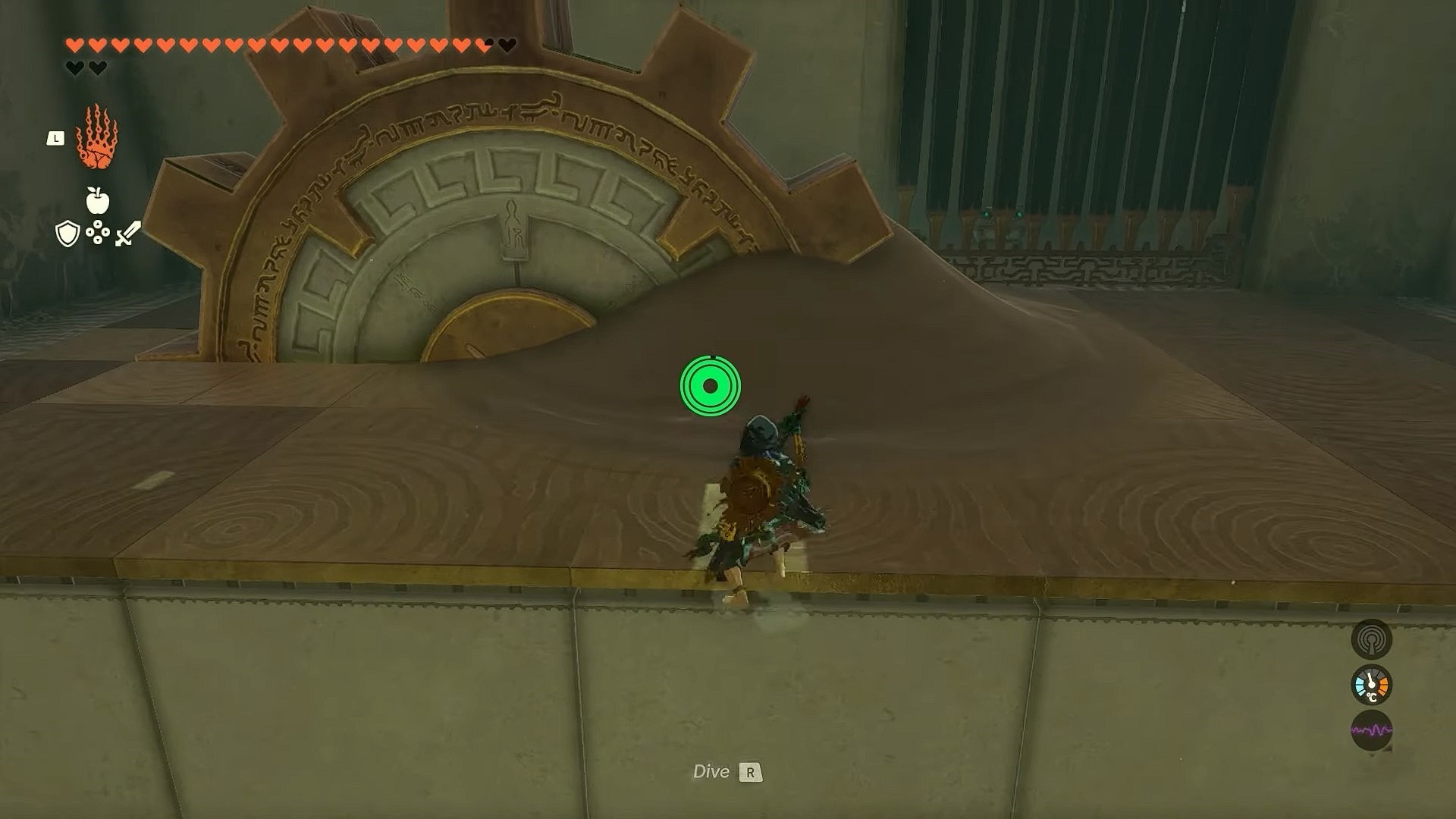 Shows the gear stuck in pile of sand in Soryotanog shrine in Zelda Tears of the Kingdom